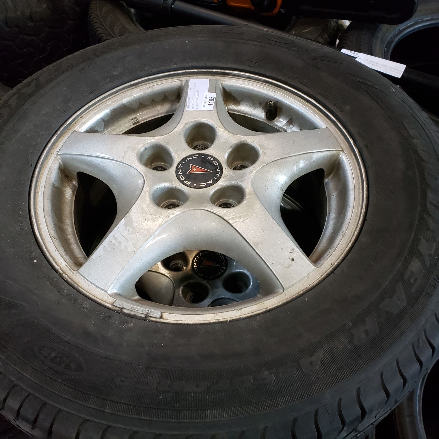 SET OF 4 P215/70 R15 TIRES ON 5 BOLT PONTIAC RIMS