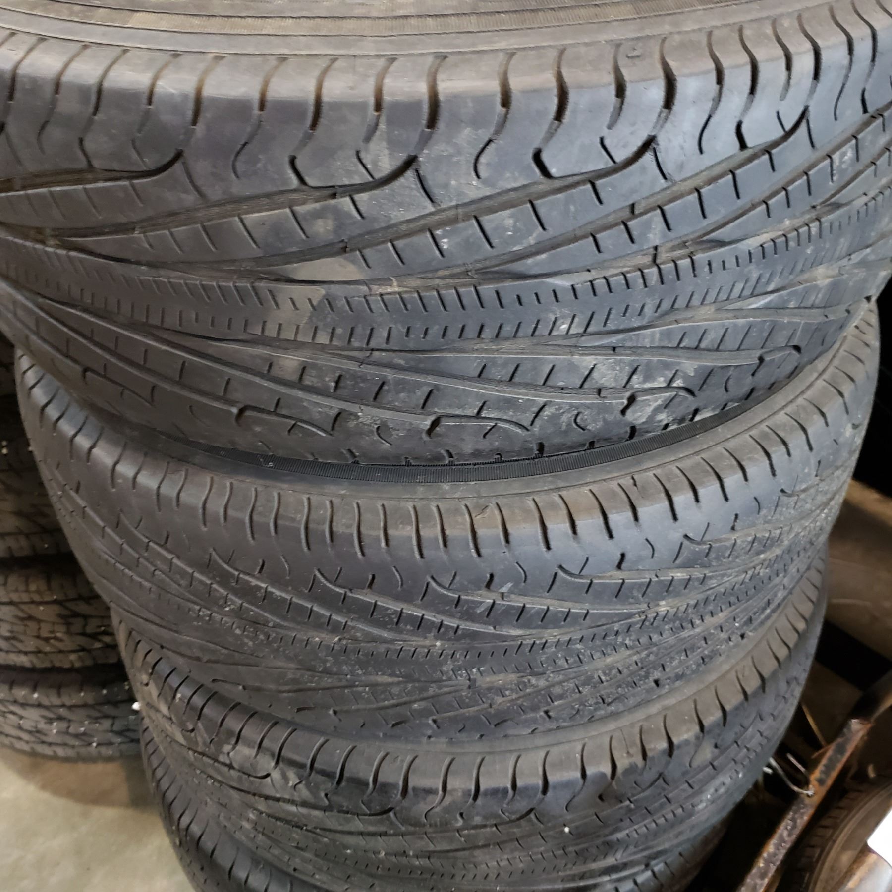 SET OF 4 P215/70 R15 TIRES ON 5 BOLT PONTIAC RIMS