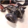 Image 2 : KONICA MINOLTA XD CAMERA W/ EXTRA LENSES AND BAG OF SUPPLIES