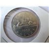 Image 2 : 1968 AND 1969 CANADIAN DOLLARS AND 1967 AMERICAN HALF DOLLAR