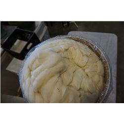 BARREL OF WHITE WOOL YARN