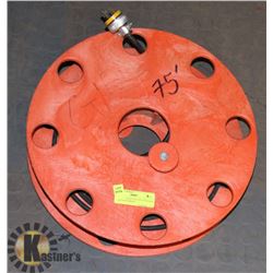 75' LIGHT GAUGE BLACK EXTENSION CORD ON STORAGE