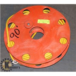 90' HEAVY GAUGE YELLOW EXTENSION CORD ON STORAGE