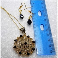 20)  GOLD TONE OPEN WORK FILAGREE PENDANT ON 24"