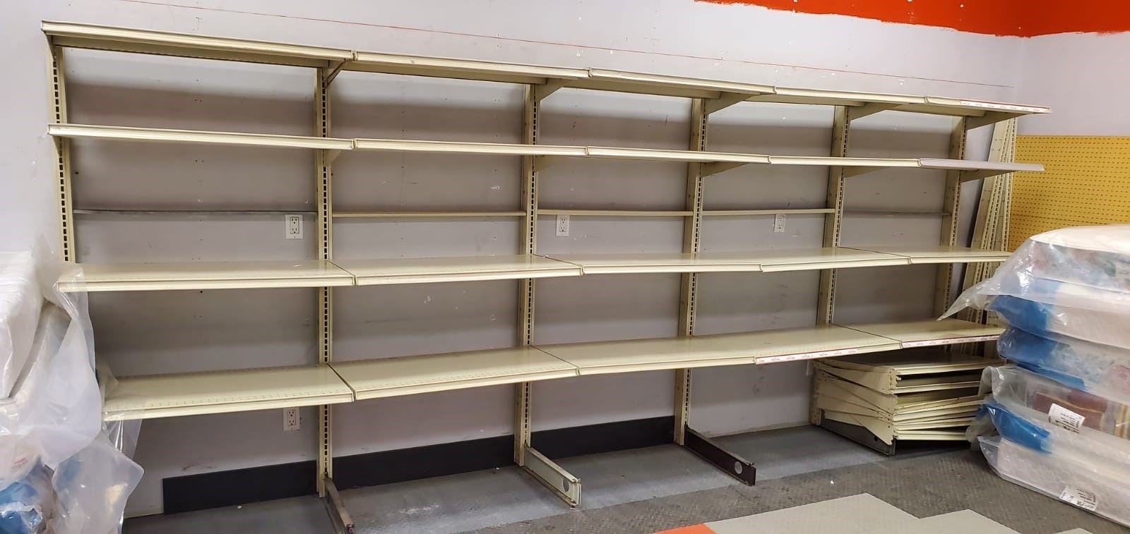 LOT OF COMMERCIAL WALL MOUNTED METAL STORE SHELVING Kastner Auctions
