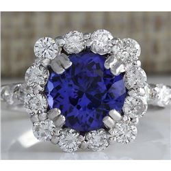 4.12 CTW Natural Blue Tanzanite And Diamond Ring In 14K White Gold