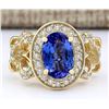 Image 1 : 3.93 CTW Natural Tanzanite And Diamond Ring In 14k Yellow Gold