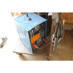 MILLER THUNDERBOLT 225 WELDER C/W ROLLING CART & CABLES