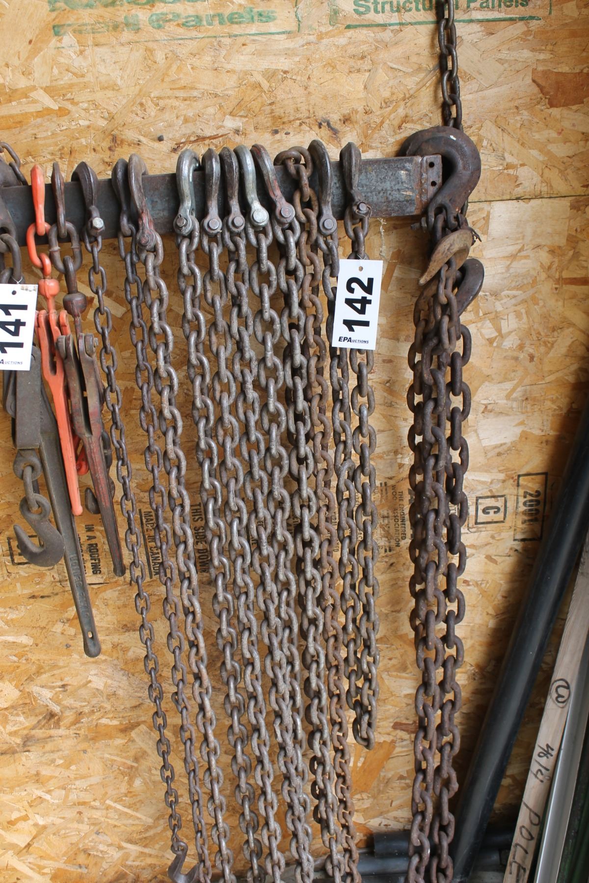 CHAINS HANGING ON WALL