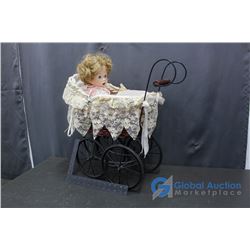 Doll in Large Buggy