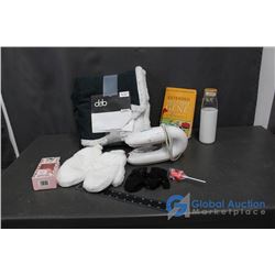 Blanket, Water Bottle, UV Light, Mittens, and Book