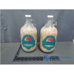 (2) Glass Half Gallon Jugs Of Barley