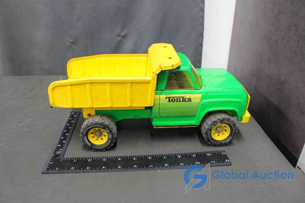 yellow metal tonka truck