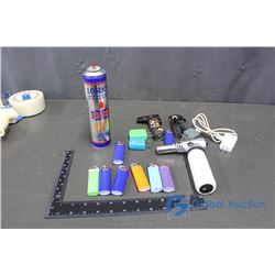 Butane Can (partially full), (2) Torches, (8) Disposable Lighters, (2) Phone Cords and (4) Adaptor P
