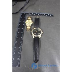 One Mens Watch and One Womens Watch