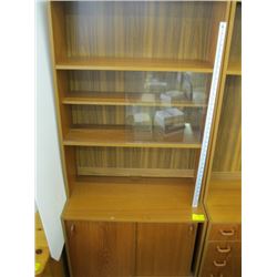 TEAK SHELF UNIT WITH SLIDING GLASS DOORS