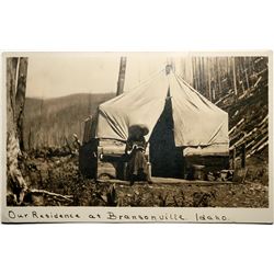 Bransonville, Idaho Real Photo Postcard, Women in front of homestead tent, cabin  (119938)