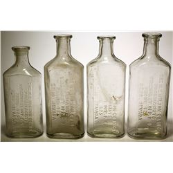 Four N. E . Wilson Co. Bottles  (57729)