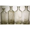 Image 1 : Four N. E . Wilson Co. Bottles  (57729)