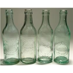 Four Phoenix Bottling Works bottles  (113089)