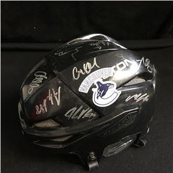 VANCOUVER CANUCKS MULTI SIGNED HOCKEY HELMET