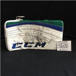 VANCOUVER CANUCKS GAME USED BLOCKER J. ERIKSSON