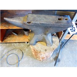 APPROX 80 LB ANVIL ON WOOD BASE