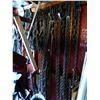 Image 2 : ASSORTED CHAINS & BOOMERS ON BACK WALL OF SHED