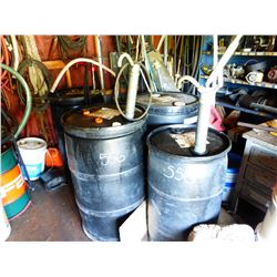 4 PLASTIC OIL BARRELS C/W QUANTITY OF OIL WITH PUMPS IN DOUBLE DOOR BUILDING