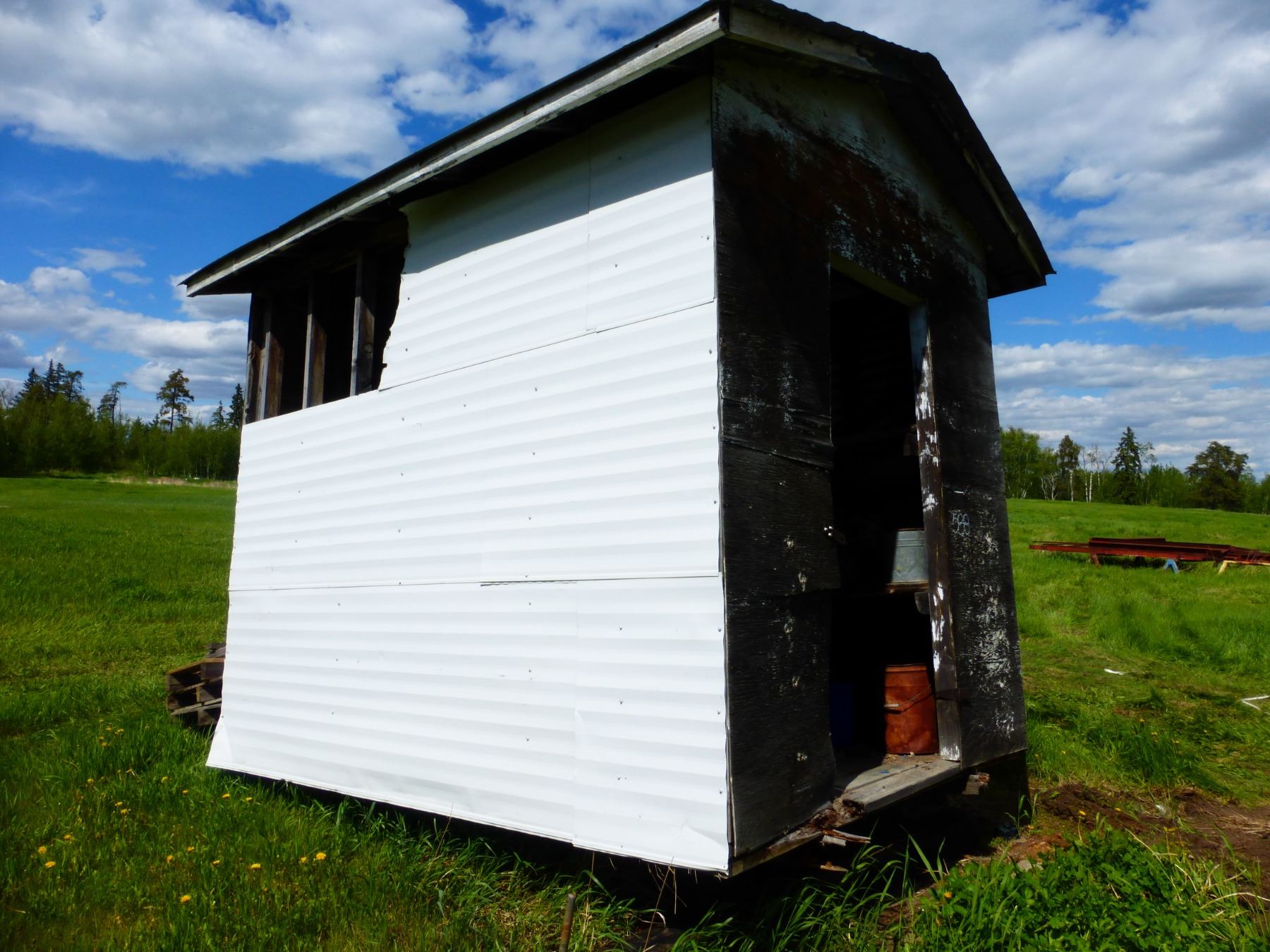 WOOD SHED ON SKIDS & CONTENTS