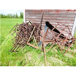PILE OF HARROWS & TRUCK HOOD