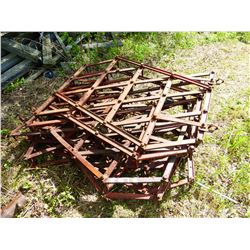 PILE OF HARROWS & DRAG BAR