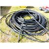 Image 1 : PILE OF BLACK PLASTIC HOSE