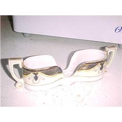 Noritake spooner, signed; 1.5" X 8" X 2" tall #943015