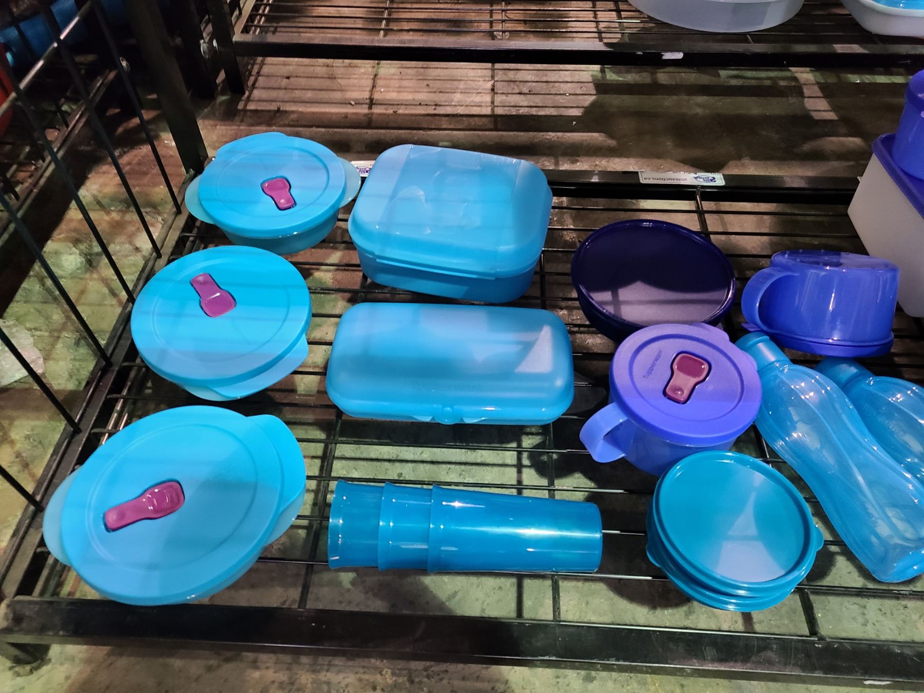 SHELF OF ASSORTED TUPPERWARE GOODS Able Auctions SHELF OF ASSORTED TUPPERWARE GOODS Able Auctions