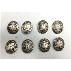 Eight Vintage Sterling Silver Conchos