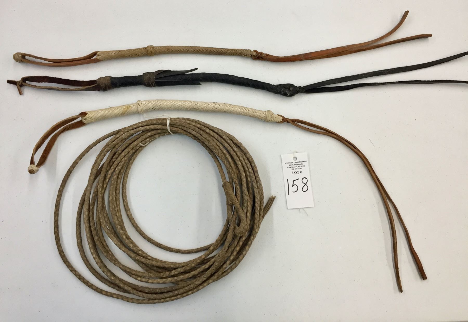 Rawhide Riata and 3 Hand Braided Quirts