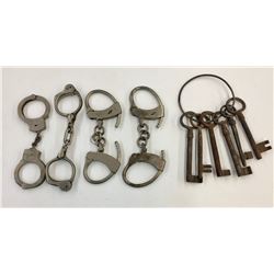Group of Vintage Handcuffs and Keys