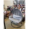 Image 1 : FLOOR MODEL MODERN RATTAN OUTDOOR DOUBLE HANGING CHAIR W/ CHARCOAL CUSHIONS - RETAIL $1799 AND RATED