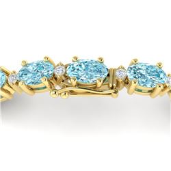 14 ctw Sky Blue Topaz & VS/SI Diamond Eternity Bracelet 10k Yellow Gold