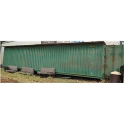Green 40' Metal Shipping/Storage Container (buyer responsible for all costs of removable/transport).