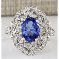 3.82 CTW Natural Blue Tanzanite And Diamond Ring In 18K White Gold