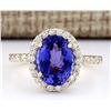 Image 1 : 4.30 CTW Natural Tanzanite And Diamond Ring In 14k Yellow Gold