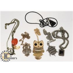 FLAT WITH 5 PIECES OF JEWELRY