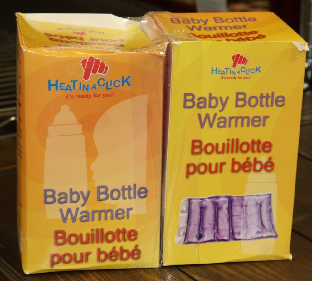LOT OF 2 NEW HEAT IN A CLICK BABY BOTTLE WARMERS