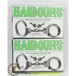 TWO SETS OF HANDCUFFS WITH KEYS