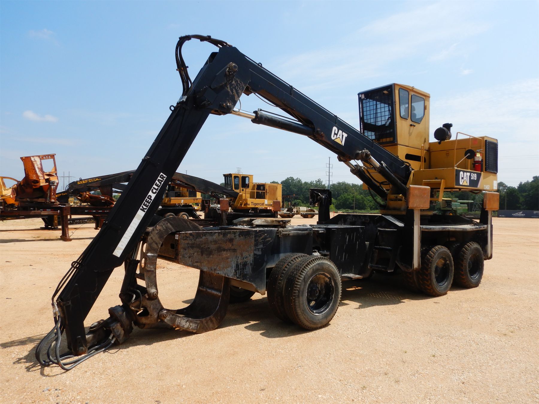 CATERPILLAR 519 Log Loader - J.M. Wood Auction Company, Inc.