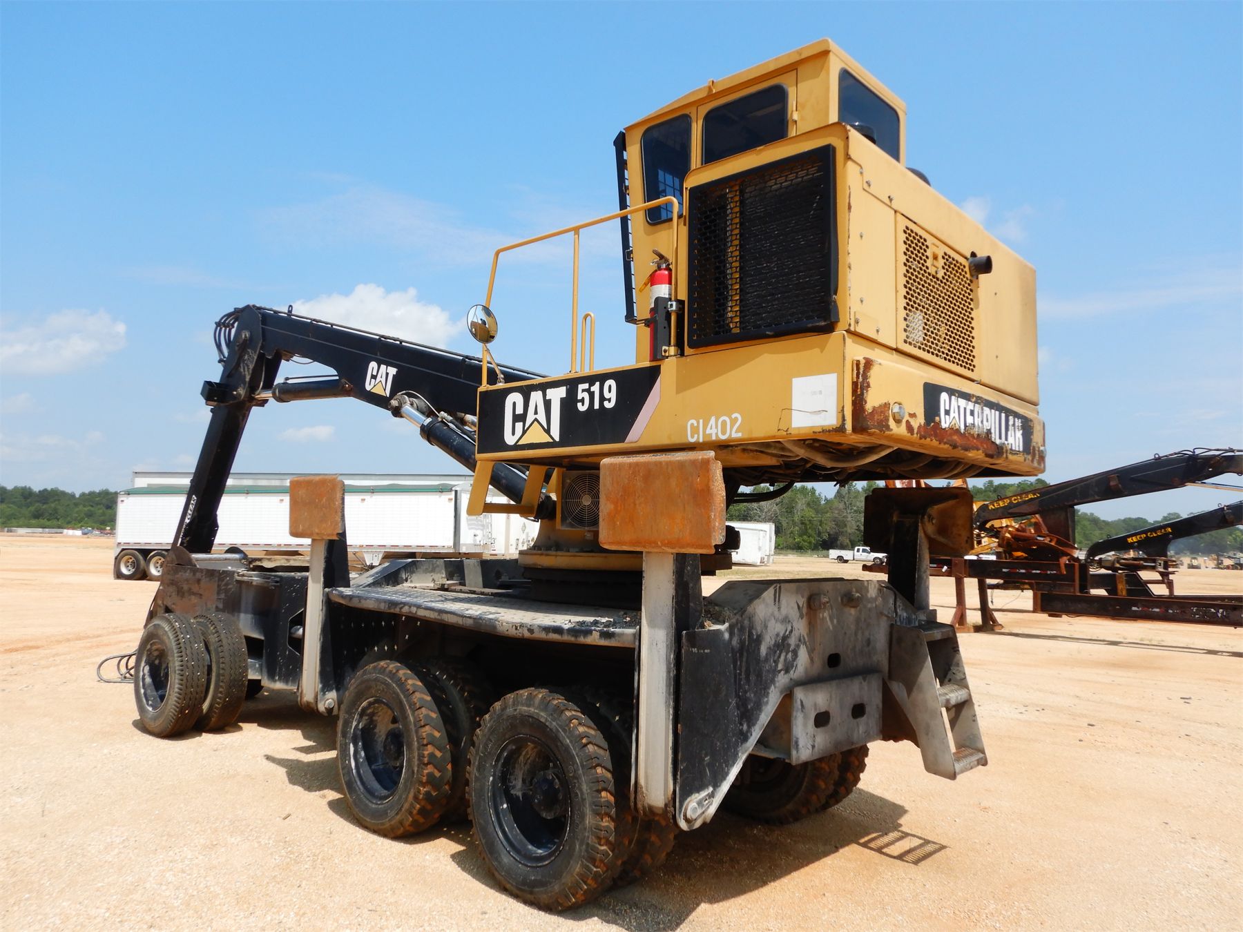CATERPILLAR 519 Log Loader - J.M. Wood Auction Company, Inc.