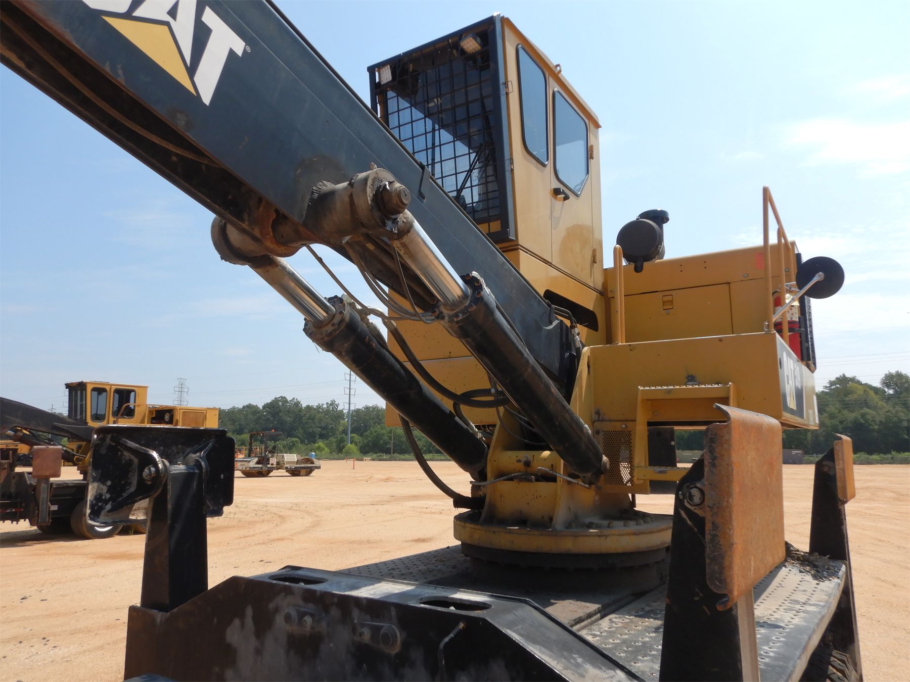 CATERPILLAR 519 Log Loader - J.M. Wood Auction Company, Inc.