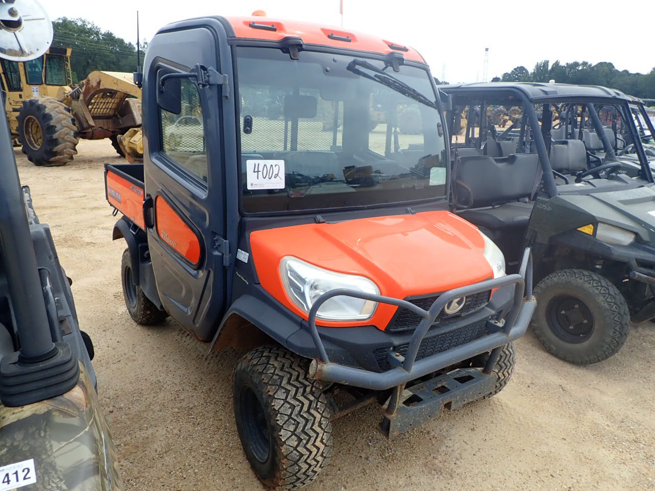 2014 KUBOTA RTVX1100C ATV / UTV / Cart J.M. Wood Auction Company, Inc.